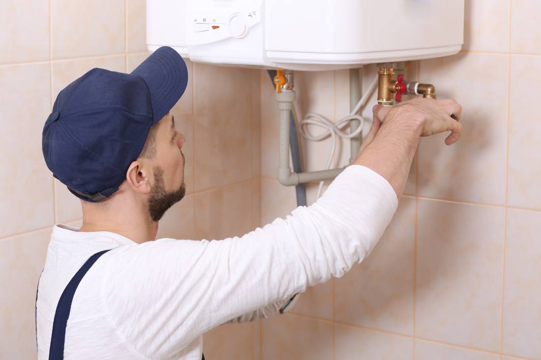 Plumber connecting a geyser